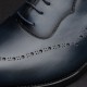 Exemple de chaussures de luxe pour homme : des richelieus noires